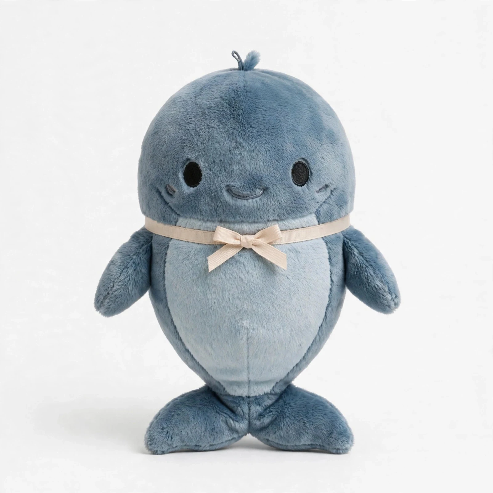 8 inch Ahab whale plush with a custom logo ribbon.